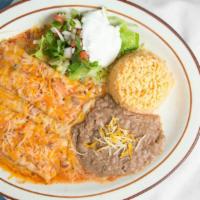 Fajita Enchiladas · Two Beef fajita enchilads, rice, beans, pico de gallo scream. Dos enchiladas de fajitas, arr...