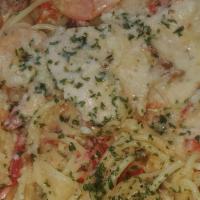 Shrimp Carbonara · Chicken breast and shrimp with red peppers and bacon with Alfredo sauce.
