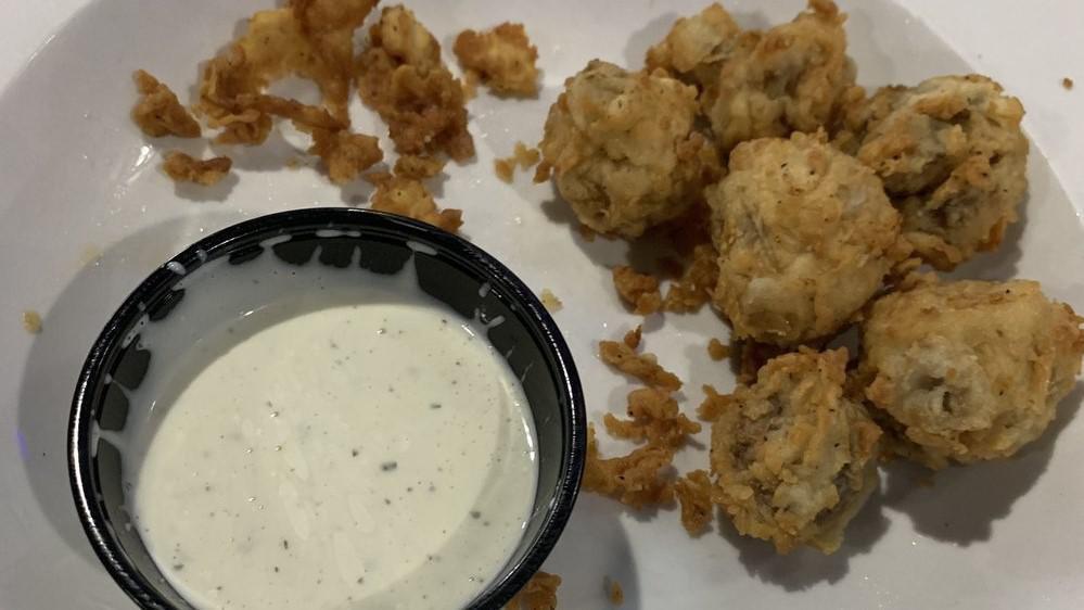 Fried Mushrooms · Hand battered mushrooms fried to perfection, served with ranch.
