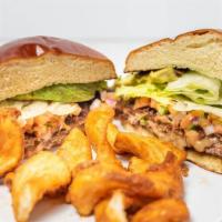 Juicy Lucy · Our signature 12 oz burger filled with smoked Gouda, pico, lettuce and avocado!