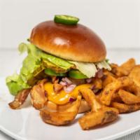 Texas Burger · 6 oz patty with mustard, lettuce tomato, onion, pickle, bacon, Cheddar cheese and fresh cut ...