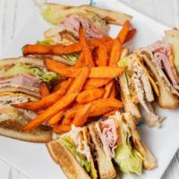 Lt'S Club Sandwich · Boar's Head turkey, black forest ham, bacon, American and Swiss cheese, mayo, lettuce, tomat...