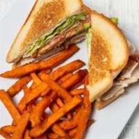 Turkey Bacon Avocado Sandwich · A turkey sandwich served Texas toast with mayo, lettuce, tomato, bacon and avocado. Served w...
