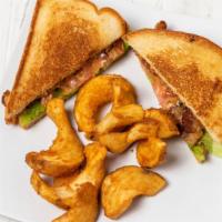 Blt · Freshly made weaved bacon mayo, lettuce and tomato on Texas toast with sidewinder fries.