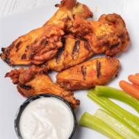 Wings (12 Pieces) · 6 or 12 deep fried chicken wings cooked to perfection with celery and carrot sticks upon req...