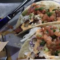 Shrimp Tacos · Two or three shrimp tacos, grilled, fried or blackened on choice of flour or corn tortillas....