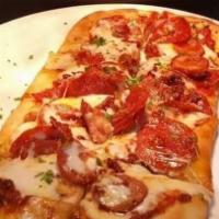 Flatbread Pizza · Your choice of cheese or pepperoni. Served with our special marinara sauce and topped with c...