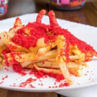 Hot Cheeto Cheese Fries · A spicy, cheese-flavored explosion! Coating french fries, with the spicy cheese puff crumbs,...