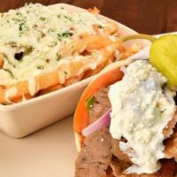 Great Greek Gyro · BEEF/LAMB OR GRILLED CHICKEN. Lettuce, Tomatoes, Red Onions, Tzatziki and Feta