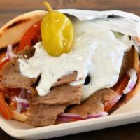 Great Greek Gyro Beef And Lamb · Beef & lamb or chicken breast
romaine lettuce - tomatoes - red onions - tzatziki - feta