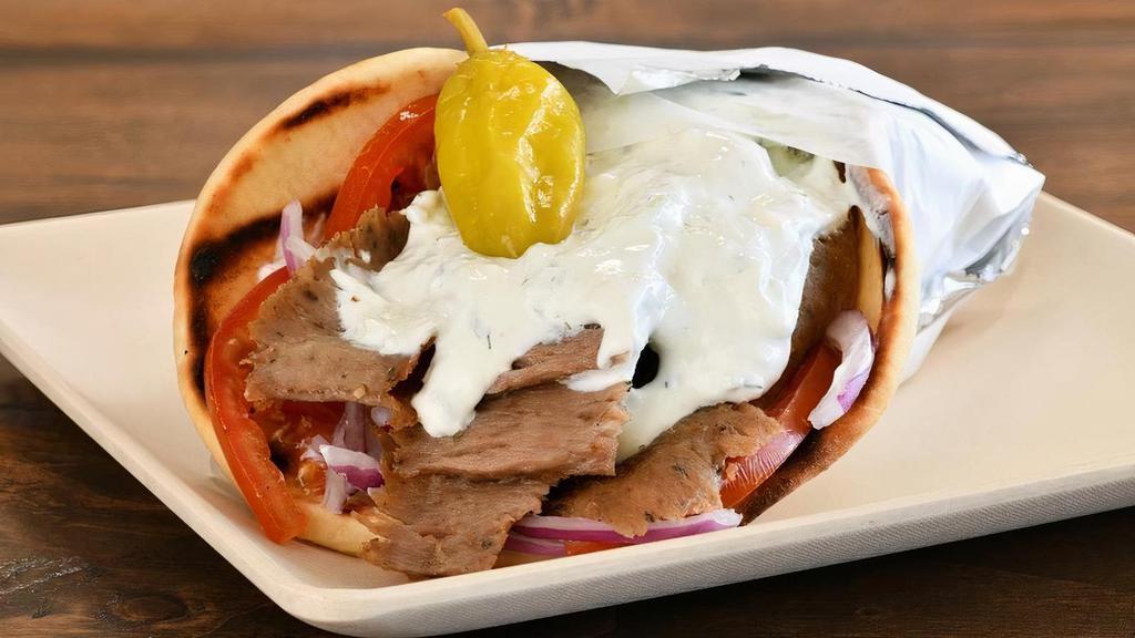 Great Greek Gyro Beef And Lamb · Beef & lamb or chicken breast
romaine lettuce - tomatoes - red onions - tzatziki - feta
