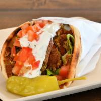 Falafel Pita · Homemade Chickpea Fritters in a Pita with Hummus, Red Onion, Lettuce, Tomatoes, and Tzatziki