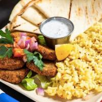 Falafel Plate · Falafel Served with Mint Yogurt, Side Salad, and Pita Bread Plus Your Choice of Rice Pilaf, ...