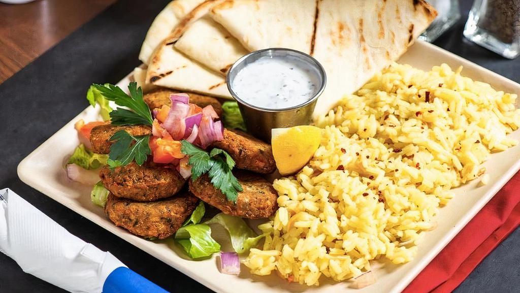 Falafel Plate · Falafel Served with Mint Yogurt, Side Salad, and Pita Bread Plus Your Choice of Rice Pilaf, French Fries or Feta Fries