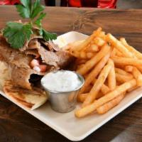 Kids Gyro Plate · Carved Gyro on Half Pita with Rice or French Fries and Chopped Salad