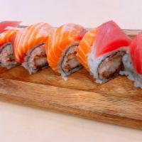 Geisha - Samurai Roll · Spicy. Shrimp tempura, cucumber, crabmeat, fresh salmon, and avocado on top with four kinds ...