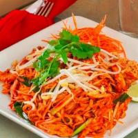 Pad Thai · Tradition thin rice noodle stir fried with your choice of meat, scallion, egg, bean sprout a...