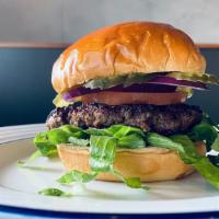 Classic Burger · 1/2 lb beef, romaine, red onions, tomatoes