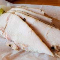 Turkey · A Turkey Breast seasoned with a salad dressing and a rosemary sage spice and smoked also kno...