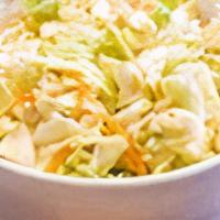 Cole Slaw · Chopped green cabbage, and carrots, mixed with a sweet creamy slaw dressing.