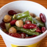 Three Bean Salad · A mixture of green, kidney and Garbanzo beans in a sweet relish dressing.