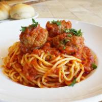 Spaghetti & Meatballs · Spaghetti tossed in our classic marinara sauce, topped with our homemade meatballs.