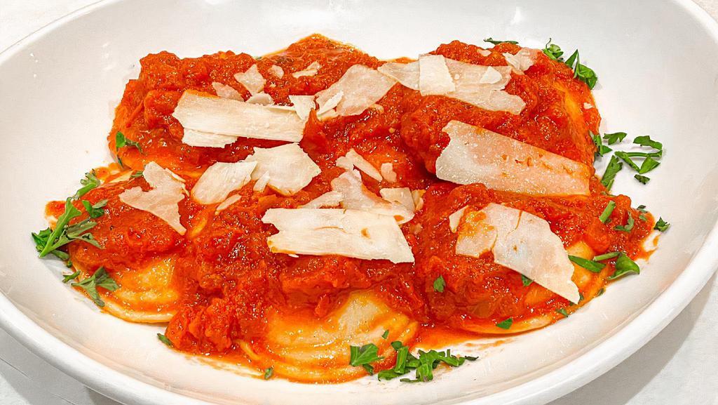 Ravioli · Stuffed with four cheese and served with marinara or alfredo sauce.