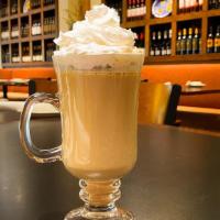 Latte · Shot of espresso, steamed milk and topped with whipped cream; served hot or iced.