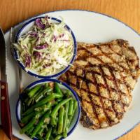 Pork Chops · Two six-ounce grilled chops.