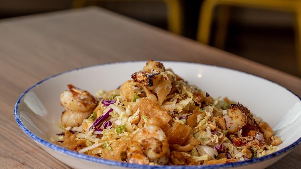 Chopped Asian Salad With Grilled Shrimp · Napa and red cabbage, peanuts, wontons, ginger soy vinaigrette.
