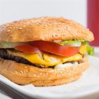 Classic Beef Burger · American-style juicy patty with lettuce, onion, tomato, and sesame bun.