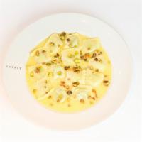Quadrati · Housemade Ricotta & Spinach-filled Pasta, Lemon Butter, Pistachios
