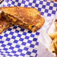 Patty Melt · 1/4 lb. hamburger patty, golden grilled onions, American cheese, on grilled Jewish Rye bread.