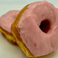 Strawberry Iced · Yeast raised donut dipped in pink strawberry flavored icing