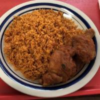 Jollof Rice · With 2 choice of meat and fried plantains.
