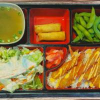 Shrimp Tempura Bento Box · Served with steamed rice, house salad, miso soup, 2 veggie egg rolls, and edamame.