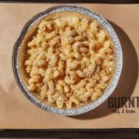 Mac & Cheese · By Burnt BBQ & Tacos. Housemade mac and cheese topped with herbed bread crumbs. Contains glu...