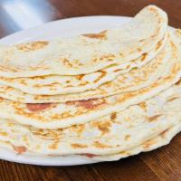 Baleada With Eggs & Tomato (Baleada Con Huevo Y Tomate) · Refried beans, sour cream, cheese, eggs with tomatoes.
Frijoles, crema, queso, huevon con to...
