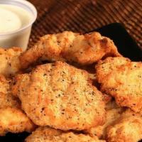 Chicken Nuggets (Dinner Made Easier Feed 4-7) · All white meat chicken nuggets. Served with your favorite dipping sauce.