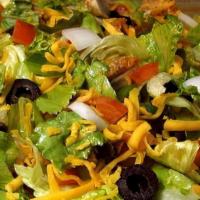 Chicken Nuggets Salad (Dinner Made Easier Feed 4-7) · Comes with fresh lettuce or spinach, chicken nuggets, onion, cheddar cheese, green pepper, b...