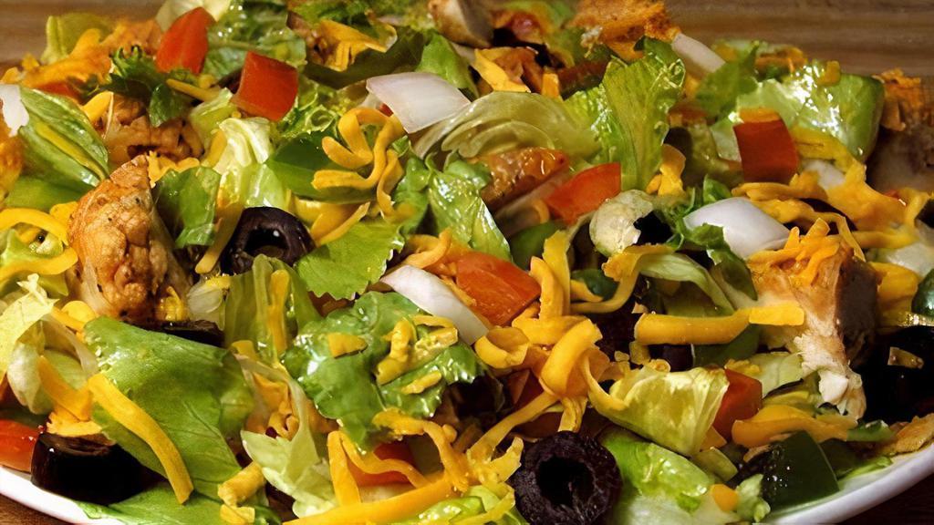 Chicken Nuggets Salad (Half) · Comes with fresh lettuce or spinach, chicken nuggets, onion, cheddar cheese, green pepper, black olive and tomato. Served with choice of dressing.
