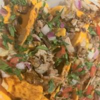 Jerk Chicken Nachos(Spicy) · Tortilla chips smothered in cheese, cilantro, tomatoes, jalapeño peppers and jerk chicken wi...