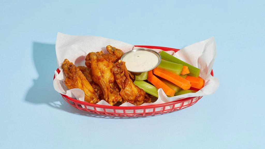 Fried Chicken Wings · (6) Bone-in wings drenched in your choice of sauce, served with celery, carrots, and blue cheese or ranch.