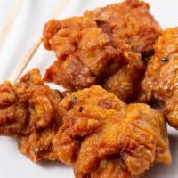 Chicken Karaage (6) · Juicy fried chicken thigh with ponzu sauce.