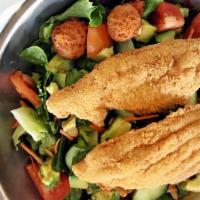 Crispy Catfish · Mixed greens topped with shredded carrots, roma tomatoes, cubed avocado, sliced cucumber, dr...