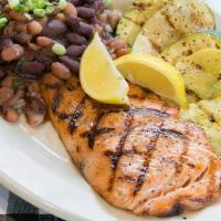 Grilled Salmon Fillet · Served with grilled vegetables, beans and rice.