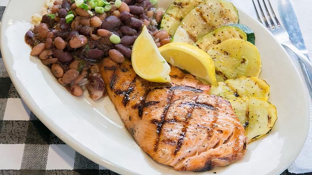 Grilled Salmon Fillet · Served with grilled vegetables, beans and rice.