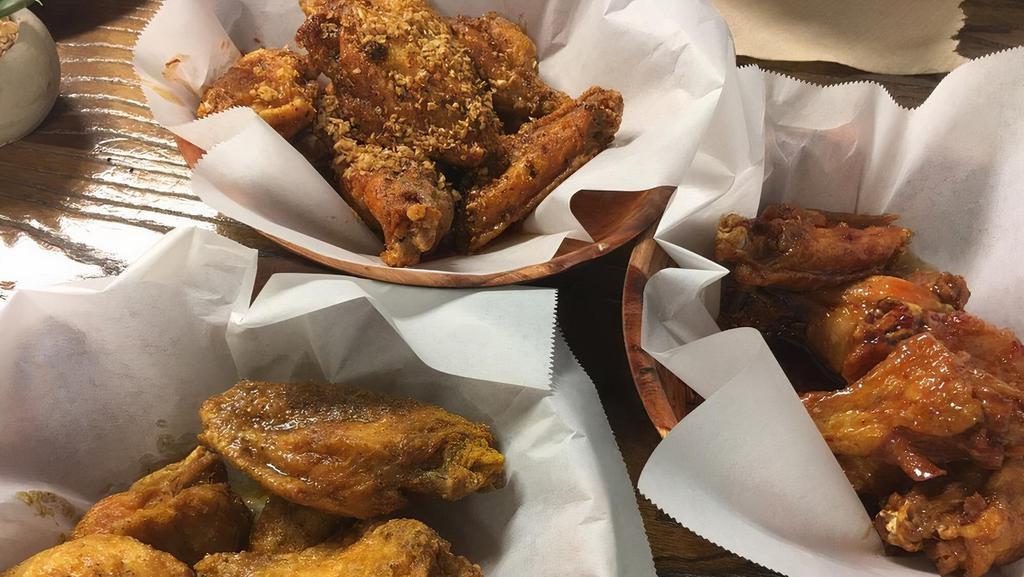 Wings (20 Pieces) · Three flavors.