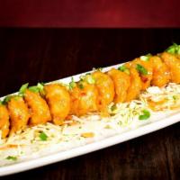 Pow Wow Shrimp · Hand-breaded shrimp lightly fried and tossed in our spicy, creamy sweet chili sauce topped w...