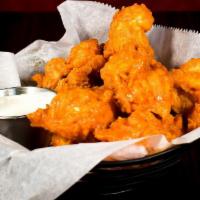 Boneless Wings · Boneless chicken hand-battered, fried and served naked or tossed in your choice of Buffalo s...